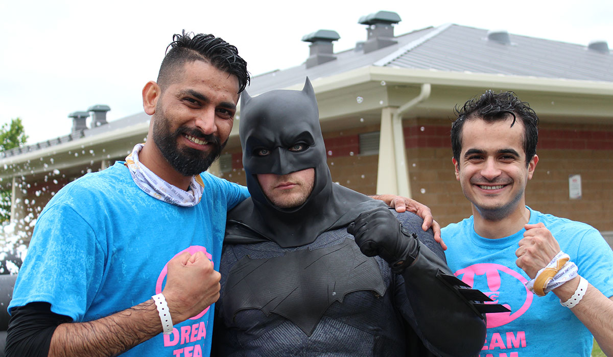 WMG employees with Batman