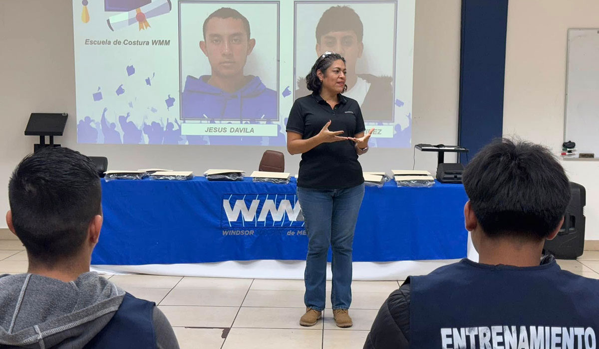 WMM employee presenting to students