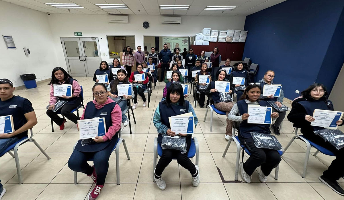 Group of employees earn diploma